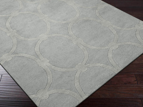 Hand-tufted of New Zealand wool, this Candice Olson plush rug exudes true art form with details of unique infinity rings in luxurious medium grey.