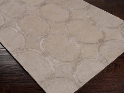 Hand-tufted of New Zealand wool, this Candice Olson plush rug exudes true art form with details of unique infinity rings in taupe. A conversation piece that enlivens any space.