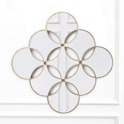 Circles of Life Wall Mirror, hand crafted and carved piece of beautiful mirror and frame. It is hand-finished in an understated vintage gold-leaf gold finish.