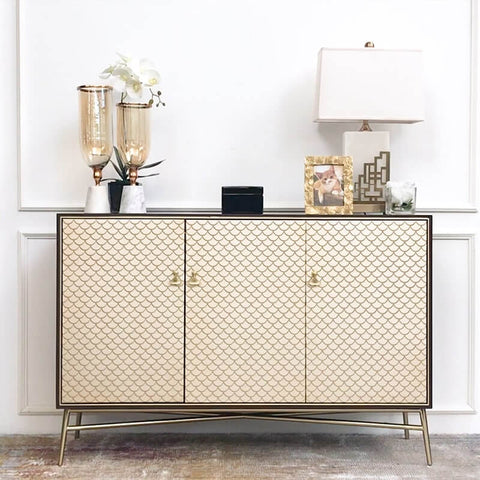 Elize 3-Door Cabinet's charming gold appeal makes an outstanding focal point for a living room console decor, or a luxury entryway decor