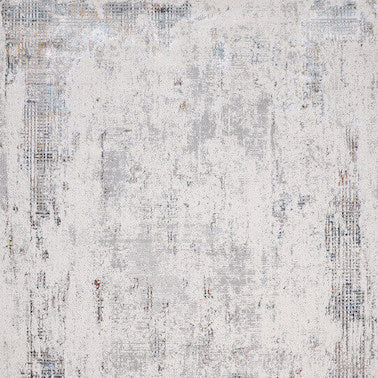 The Carrara Art Rug, features a scattered, distressed look, giving it a modern home finish.