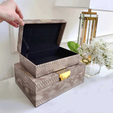 Snakeskin taupe leather boxes stacked from small to large, perfect for console table decor.
