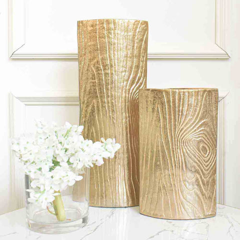 Small Georg timber vase with timber details on metallic body.