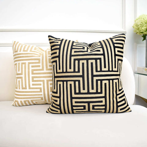 Muse embroidered square geometric pillow.
