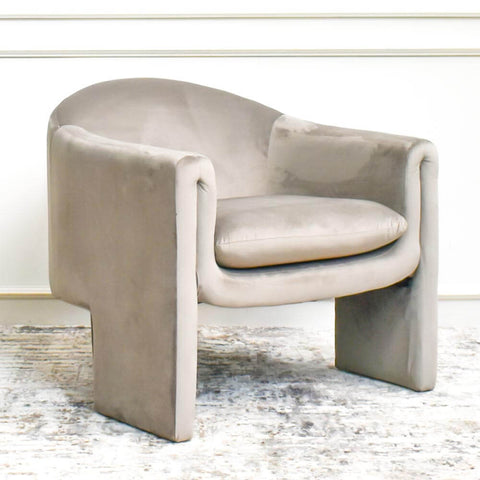 A Sexy Curved Sillhouette Armchair inspired by Mid-Century Modern Design, Parc Velvet Armchair in Light Taupe.