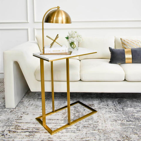 Voted as the designer’s choice, this One Draycott C-Shaped Marble End Table is the perfect solution for small condominiums or smaller rooms. With multi-purpose usage, this table slides under under the Chesterfield sofa for easy table accessibility.