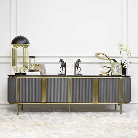 Verity 4-Door Marble TV Console with Black and Gold Decor Ideas for Modern Luxury Living Design.