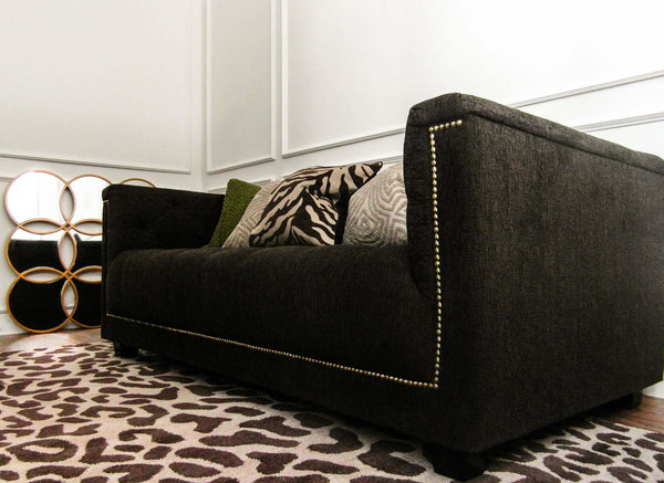 Finn Avenue's Brown Chesterfield sofa with Terry-like fabric on kiln-dry solid wood frame with vintage nail head trim detailing.