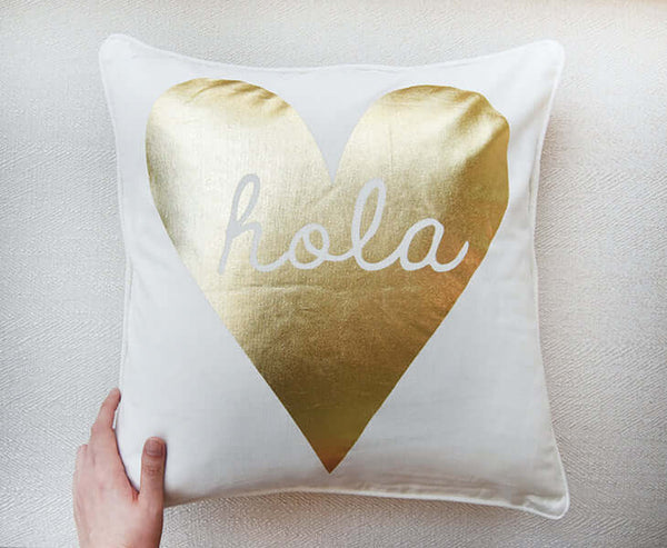 Cushion with Gold heart shaped detail.
