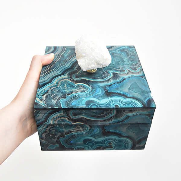 Details of marble swirls on Artemis trinket box, in blue and teal swirls with natural crystal stone on handle.