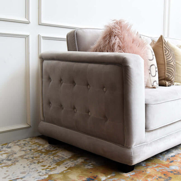 Adaliz Sofa styled with plush cushions, highlighting its vintage-inspired profile and deep seating.