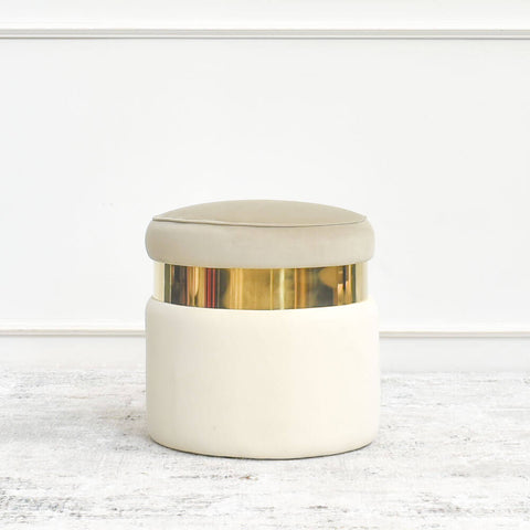 Alba round ottoman, also often used as vanity stool, with neutral colours and gold details for modern luxurious home inspirations.
