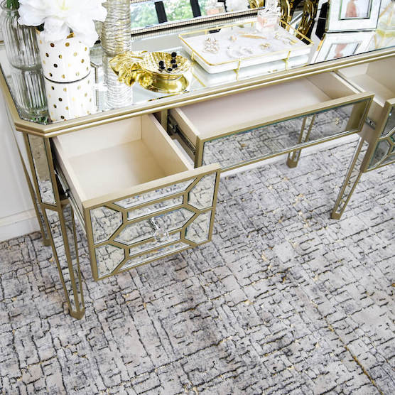 Internal drawer details of Alchemy mirrored table, crystal embellished handles.