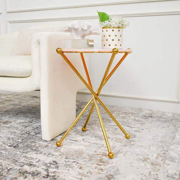 Exquisite details in the  sturdy stainless steel sculptured polished gold legs of the Amber Park Gold Marble End Table.