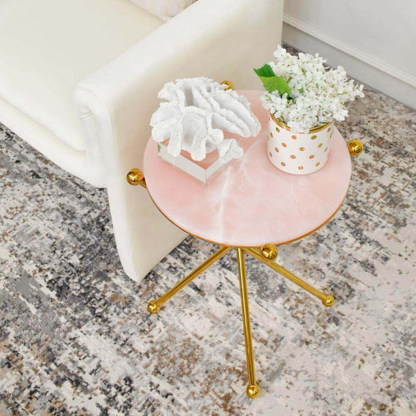 Petite and bursting in loveliness, this pink marble accent end table is a perfect addition to this transitional and modern luxury living room. 