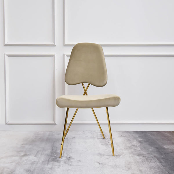 Front view of Artus Gold Dining chair, all purpose Artus chair, soft champagne gold velvet seats.