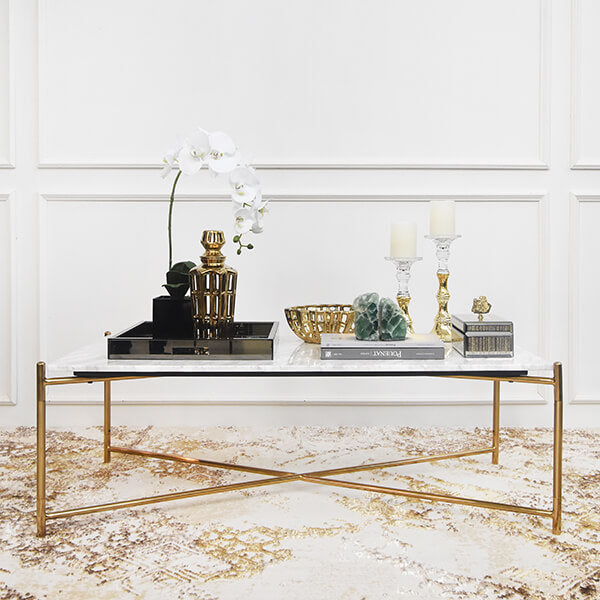 Slim stainless steel legs in polished gold finish for a neat and modern living room look.