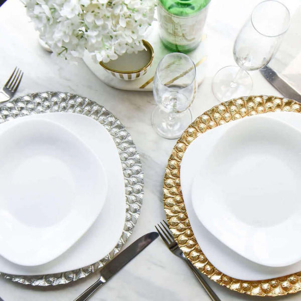 Dining Ware Silver Charger Plate on table decor display with wine glass.