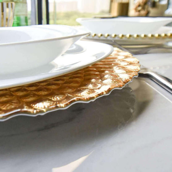 Zoom in side view image of the Barbican Gold Glass Charger Dining Ware Scalloped Design.