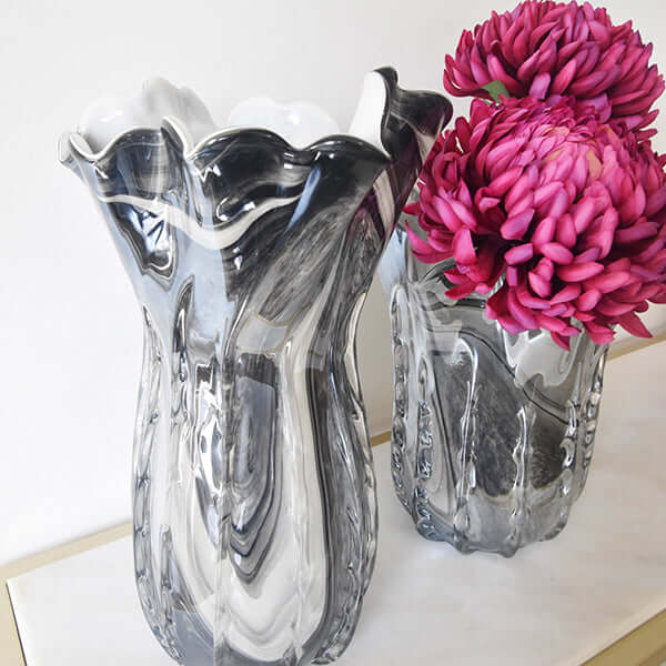 Side view of Bouges vase with Chrysanthemum flower for a pop of colour.