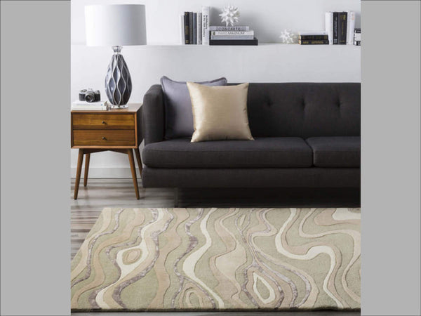 Candice Olson Designer Collection: Modern Classics Dreams Rug against a black sofa and wood side table, living room styling ideas.