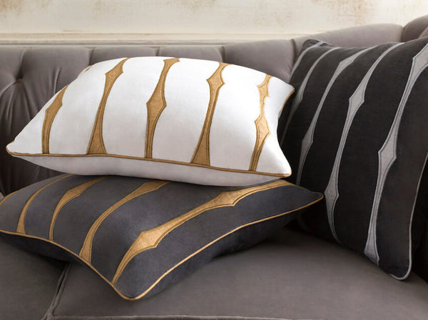 Candice Olson Graphic Stripe Throw Cushions Styled Shot on Living Room Sofa at Furniture Store.