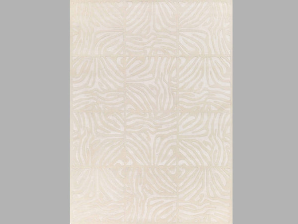 Vertical view of the larger size Candice Olson Labyrinth ivory wool rug.