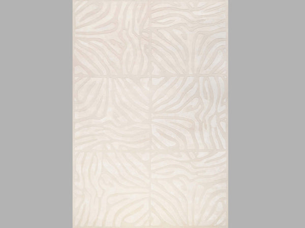 Close up of the Candice Olson Labyrinth maze like Ivory rug.