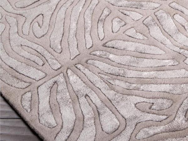 Corner edge look of the details in the Candice Olson rug, intricate maze like details in the hand tufted wool rug.