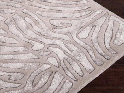 Close up look of the maze patterns on the Labyrinth Taupe Rug.