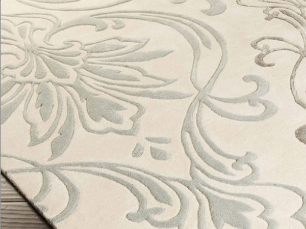 Zoom in of Silver floral motifs details in the Floret Silver Rug.