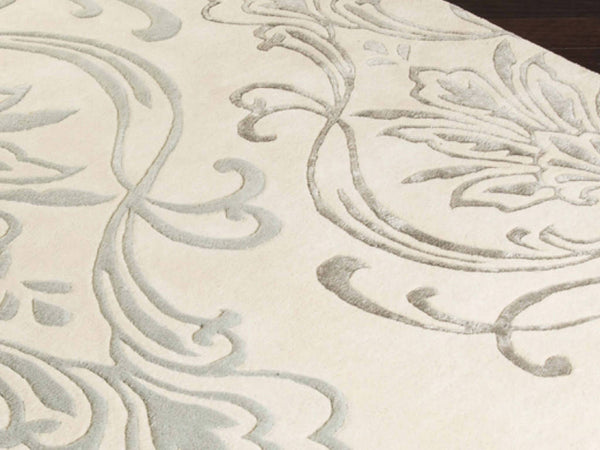 Close up look of the Floret Candice Olson rug, with hand tufted woven wool detailings in a beautiful silver hue.