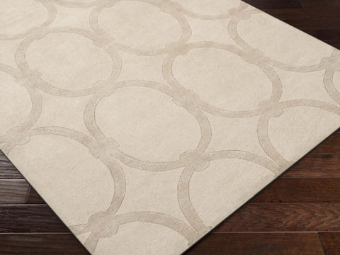 Hand-tufted of New Zealand wool, this Candice Olson plush rug exudes true art form with details of unique infinity rings in luxurious ivory. A conversation piece that enlivens any space.