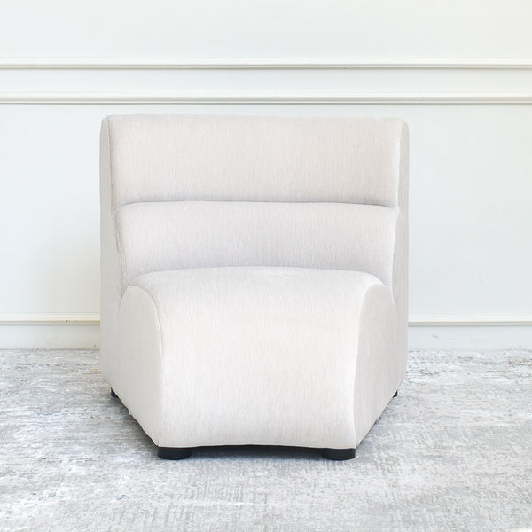 Cava 1-Seater Concave Modular Sofa Armchair in beige velvet, top view showing its unique inward curve, ideal for custom sectional arrangements.
