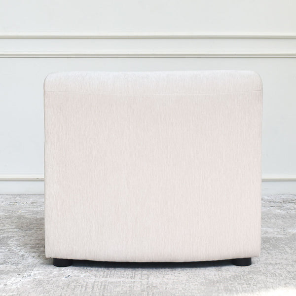 Cava 1-Seater Concave Modular Sofa Armchair in velvet upholstery, back view, detailing the smooth lines and premium velvet fabric texture, and quality construction.