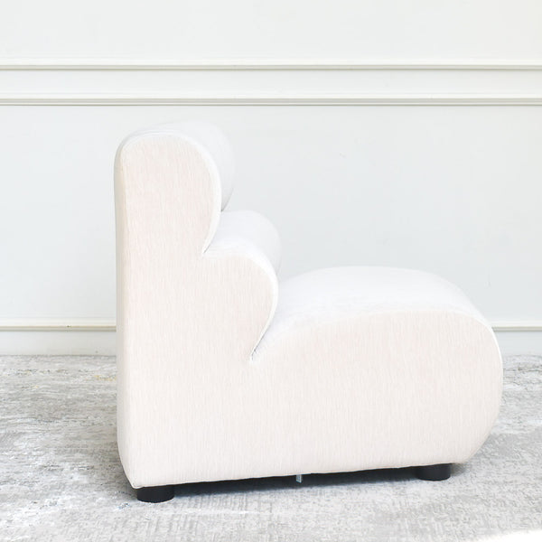 Cava 1-Seater Concave Modular Sofa Armchair,  side view, detailing the smooth lines and premium velvet fabric texture.