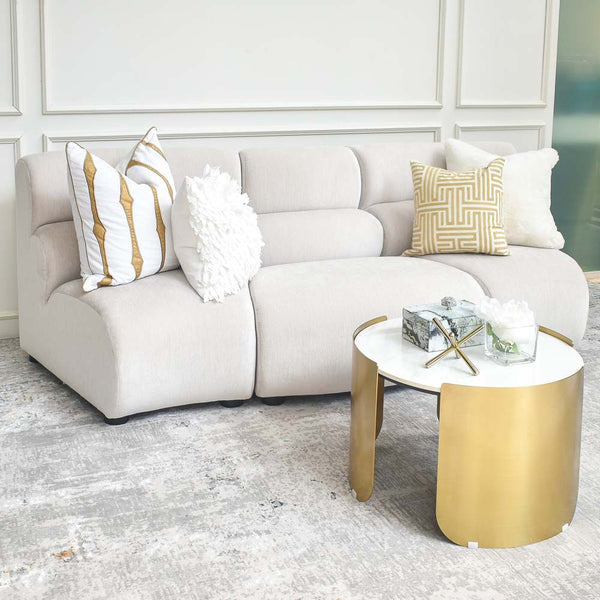 Cava 3-Seater Curved Modular Sofa styled in white and gold living room, emphasizing its space-saving depth and quality construction.