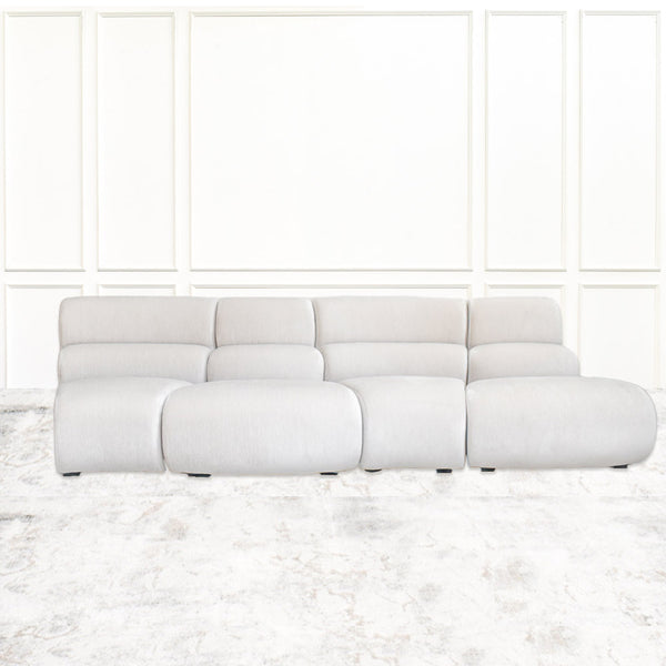 Cava 4-Seater Curved Modular Sofa, front view, offering comfortable seating and contemporary style in a Singapore apartment.
