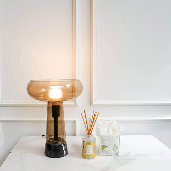 The translucent shade allows the warm light to cascade and flow freely for a bright glowing space. All glass classy accents enhances the perfect minimalist touch for any side table.