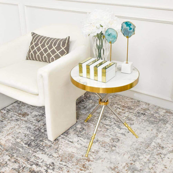 Cristian End Table sits glamorously in living room next to armchair. It is the perfect Mid-Century Modern end table.