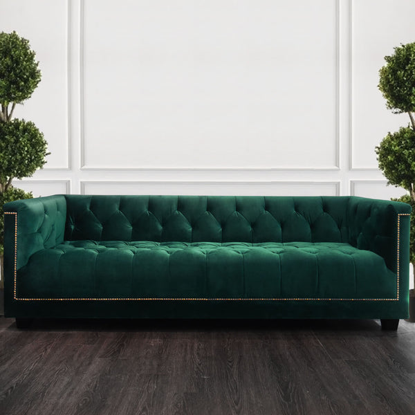 Front view of the Earl sofa in rich emerald green velvet, adding a bold pop of color with luxurious texture.