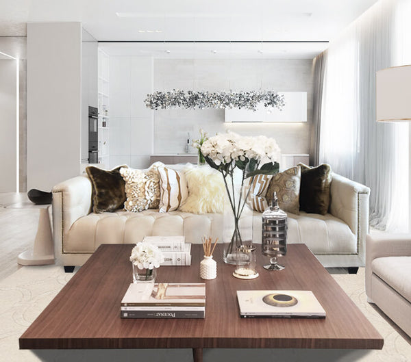 Style the Duchess of Chesterfield sofa in brown and ivory hues for a soft living room look. 