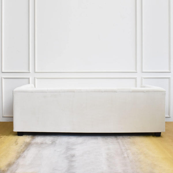 Back view of smooth velvet on Chesterfield style sofa.