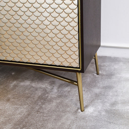 Close up look of the Gold slim legs on the Elize 2 Door Cabinet.