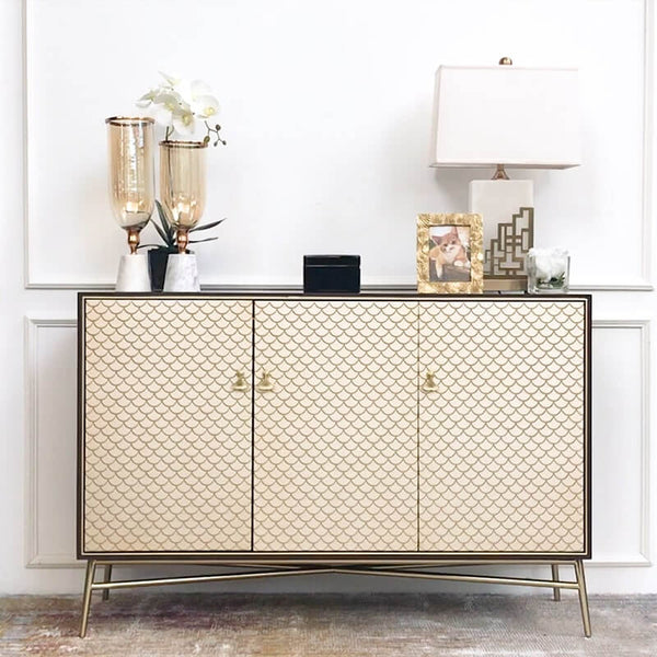 Elize 3-Door Cabinet's charming gold appeal makes an outstanding focal point for a living room console decor, or a luxury entryway decor
