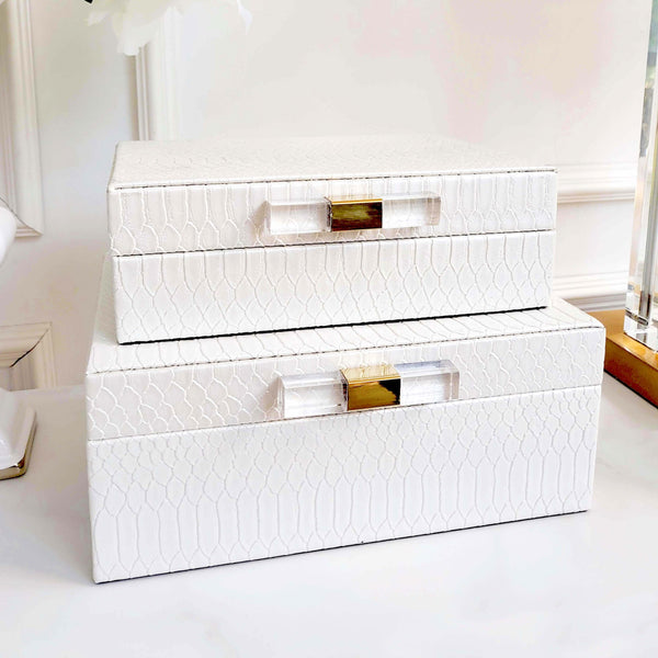 White and gold leather boxes decluttering and decorating ideas.