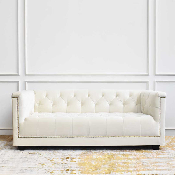 Hand tufted details on Chesterfield sofa, creating the perfect modern sofa with a mid-century twist. The perfect statement sofa for your living room. 