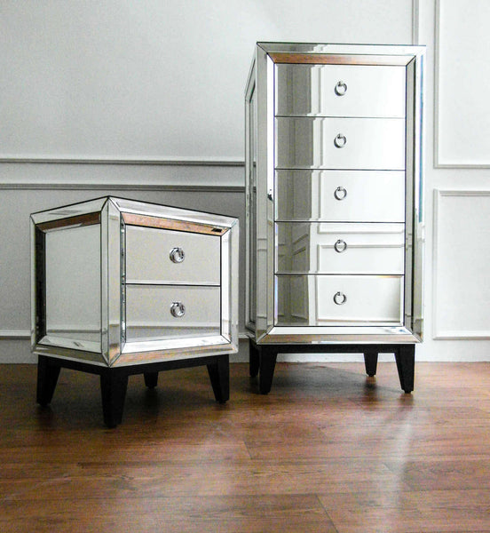 Etienne Mirrored Cabinetry Set is available in a Tall Boy Chest of 5 Drawers and a side table nightstand of 2 Drawers to complement a luxury bedroom.
