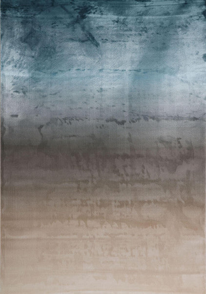 Evka luxury rug that embodies nature using subdued warm neutral colors with hints of metallic dusty blue for living room home design with a pop of blue.