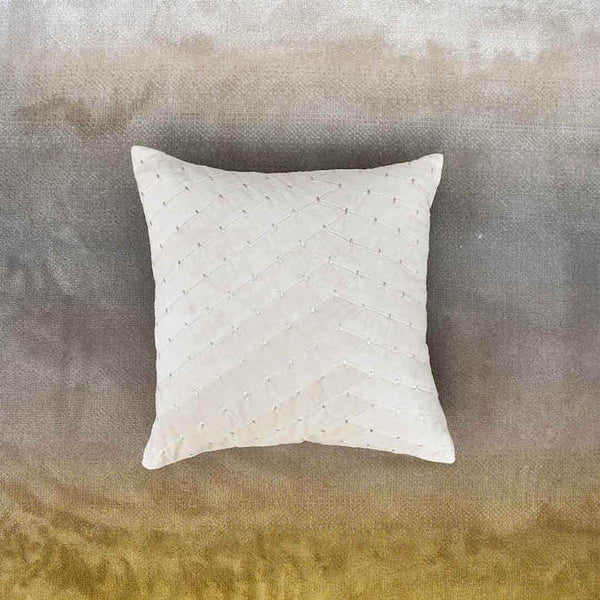 Paige Stitched Cushion, Velvet Taupe on top of the Evka Sun rug.